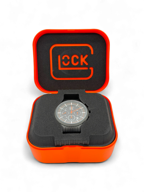 Original Glock Uhr Global mit orangem und schwarzem Mesh Band im orangen Glock Case