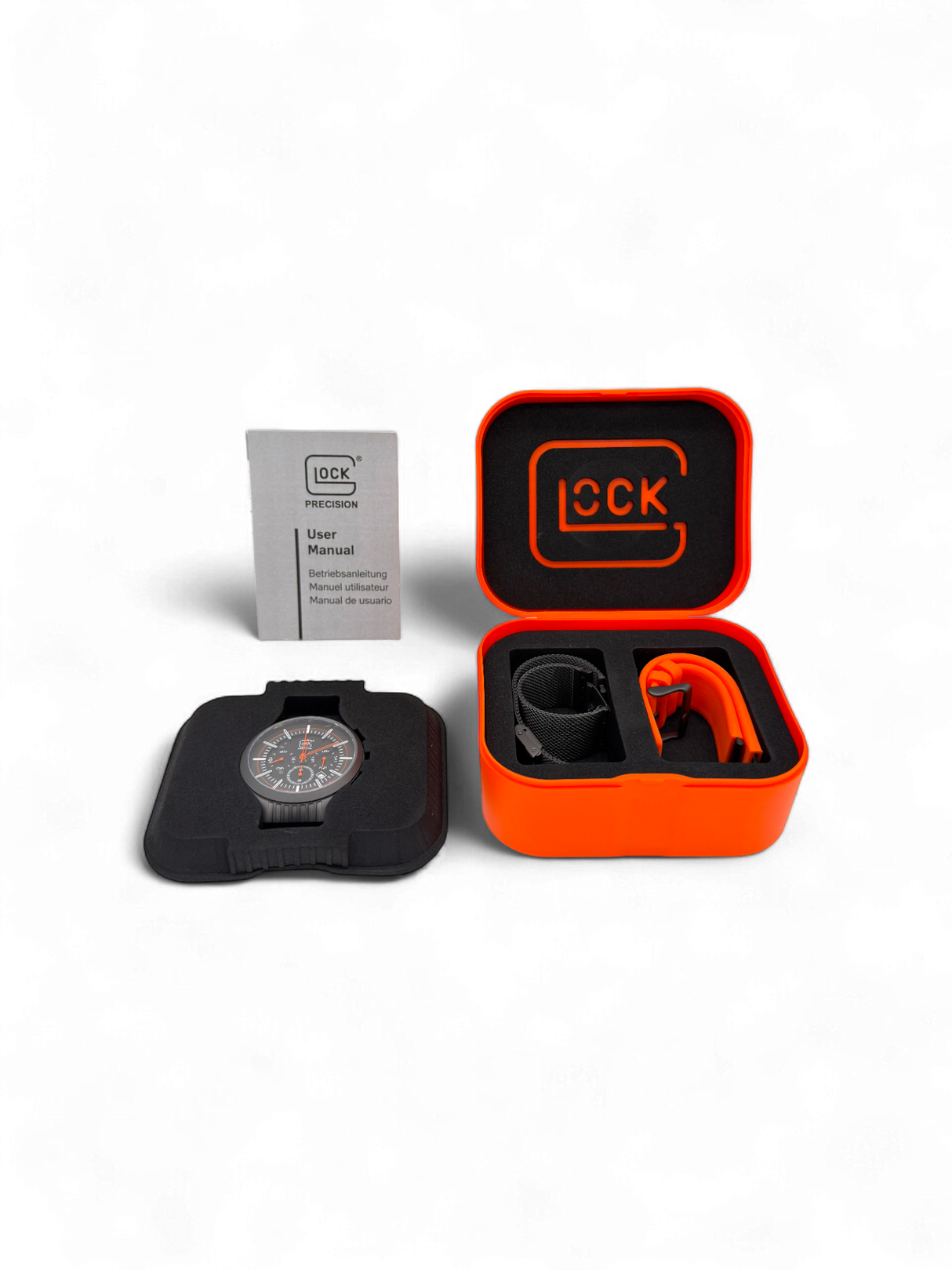 Original Glock Uhr Global mit orangem und schwarzem Mesh Band im orangen Glock Case