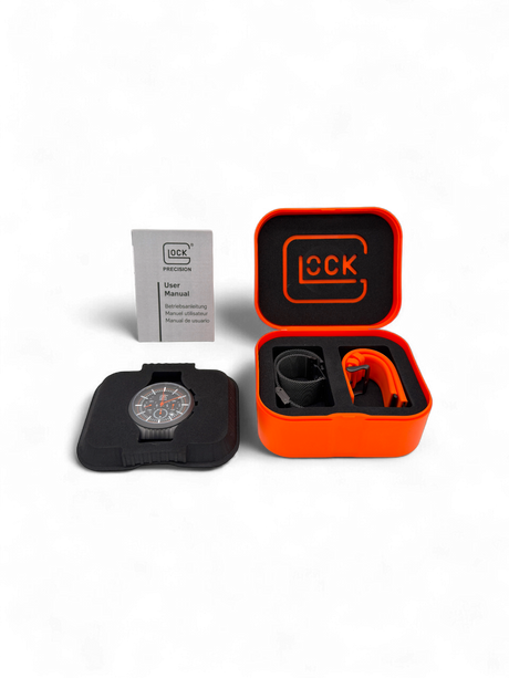 Original Glock Uhr Global mit orangem und schwarzem Mesh Band im orangen Glock Case